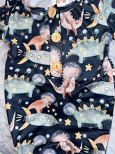 Load image into Gallery viewer, Baby in Styles - Dino astronauts knotted gown and hat set.