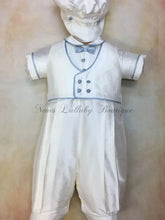 Load image into Gallery viewer, Blue Willie by Piccolo Bacio Christening Couture comes in white silk adorned with blue piping