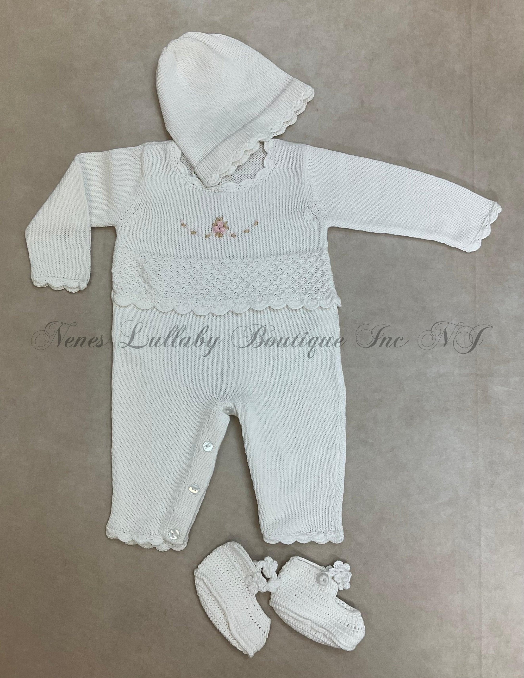 Cream handmade knit with embroidered flower