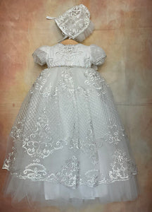 Vera Christening Gown By Piccolo Bacio white metallic lace, rhinestone accents & sheer cap sleeves with matching bonnet